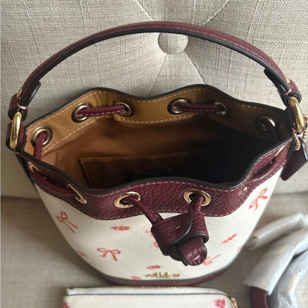 Coach Dempsey Drawstring Bucket Bag 15 With Bow Print In Chalk Wine & wristlet - Picture 6 of 6